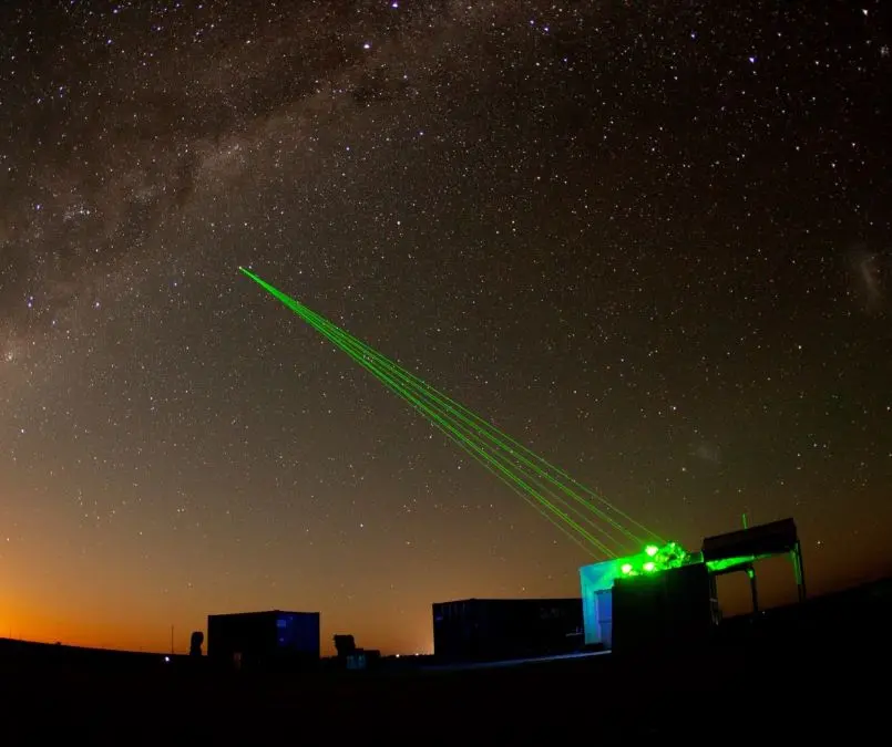 Portable green laser system operating during a nighttime calibration and test activity